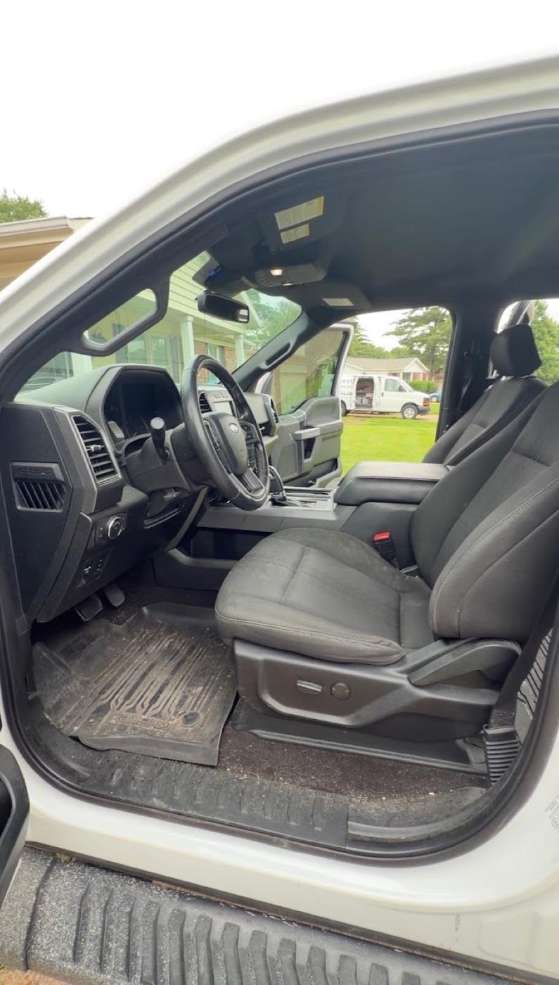 Truck interior floor mat, dirty, before detailing